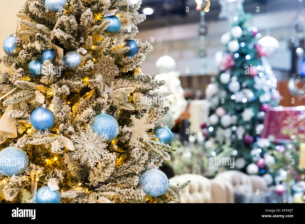 Christmas tree with blue balls and lights, garland Stock Photo - Alamy