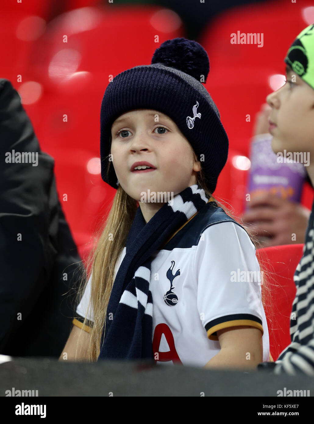 A young Tottenham Hotspur' fan in the stands during the Carabao Cup, Fourth Round match at Wembley, London. PRESS ASSOCIATION Photo. Picture date: Wednesday October 25, 2017. See PA story SOCCER Tottenham. Photo credit should read: Steven Paston/PA Wire. RESTRICTIONS: No use with unauthorised audio, video, data, fixture lists, club/league logos or 'live' services. Online in-match use limited to 75 images, no video emulation. No use in betting, games or single club/league/player publications. Stock Photo