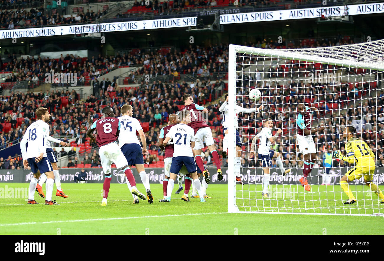 West Ham United's Angelo Ogbonna (right) scores his side's third goal of the game during the Carabao Cup, Fourth Round match at Wembley, London. PRESS ASSOCIATION Photo. Picture date: Wednesday October 25, 2017. See PA story SOCCER Tottenham. Photo credit should read: Steven Paston/PA Wire. RESTRICTIONS: No use with unauthorised audio, video, data, fixture lists, club/league logos or 'live' services. Online in-match use limited to 75 images, no video emulation. No use in betting, games or single club/league/player publications. Stock Photo