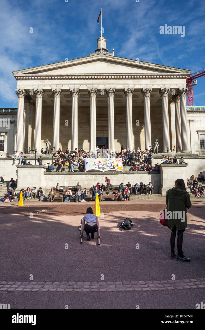 Students having lunch in the Quad during Charity Week at University College London, UK Stock Photo