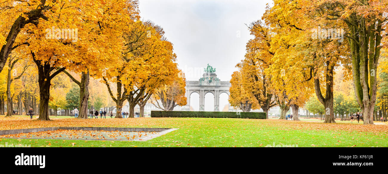 Fall trees in Jubelpark and Triumphal Arch in Brussels, Belgium. Stock Photo