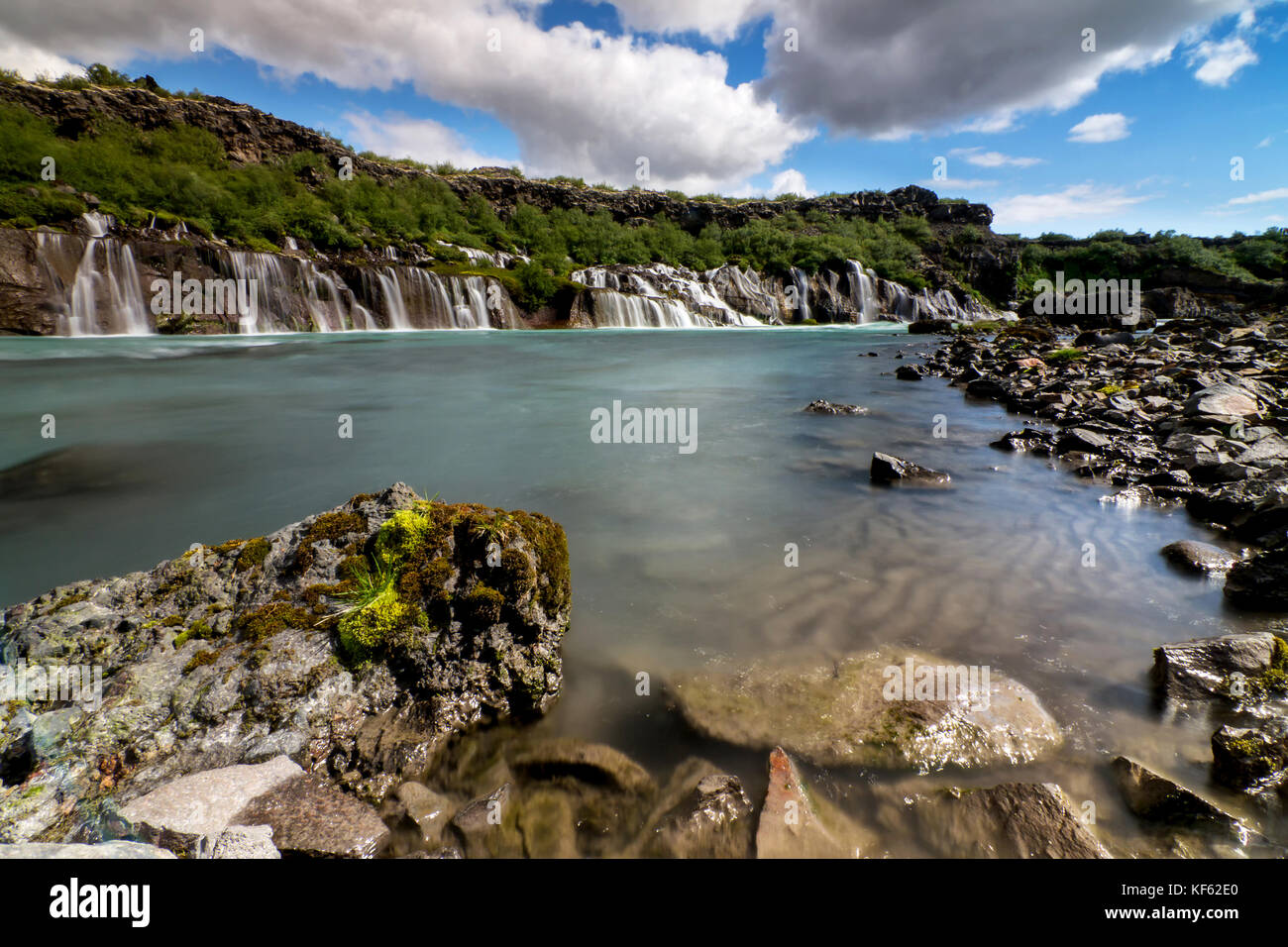 Hraunfossar or Lava Falls, near Husafell Iceland. These beautiful falls come from underneath the nearby lava field near Husafell Stock Photo