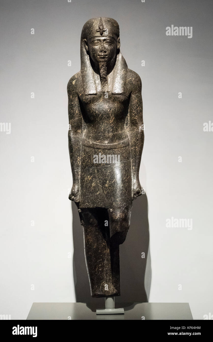 Turin. Italy. Statue of Egyptian Ptolemaic king in Pharaonic regalia wearing the nemes headdress, the shendyt and a false beard. Ptolemaic Period (332 Stock Photo