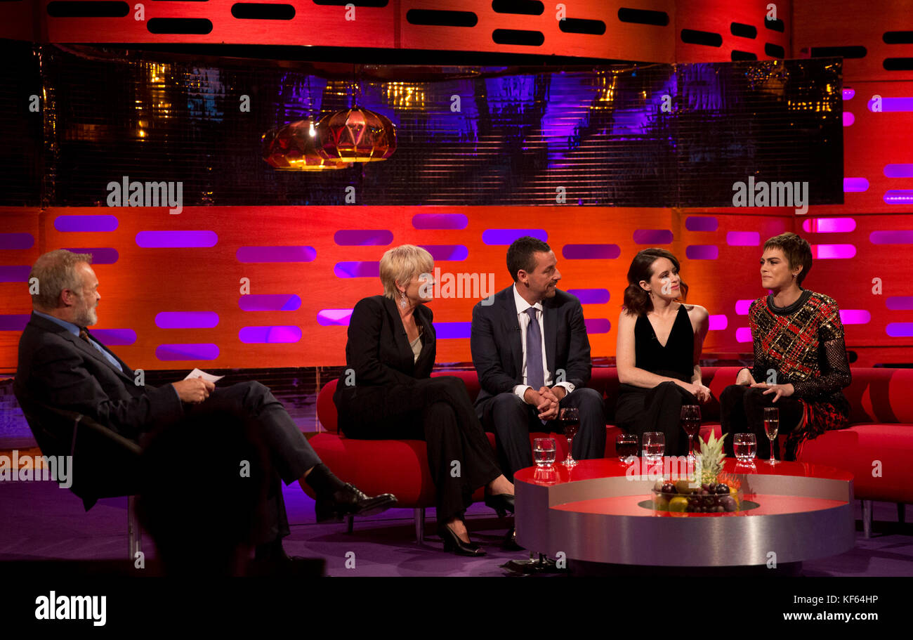 left to right) Host Graham Norton, Emma Thompson, Adam Sandler, Claire Foy  and Cara Delevingne during filming of the Graham Norton Show at the London  Studios, to be aired on BBC One