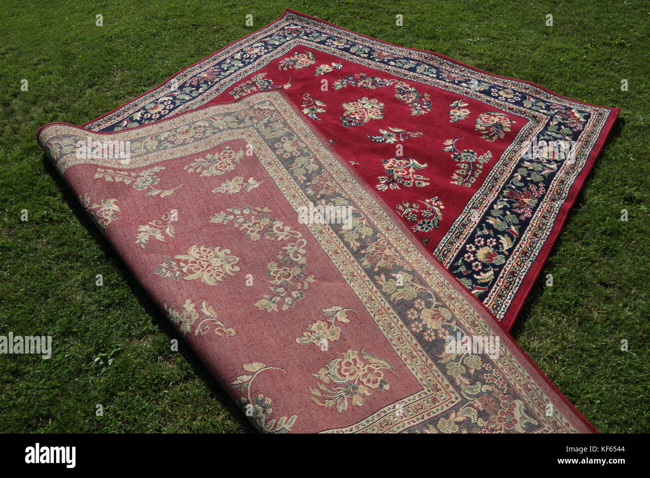 Traditional Rug with Floral Pattern Stock Photo - Alamy