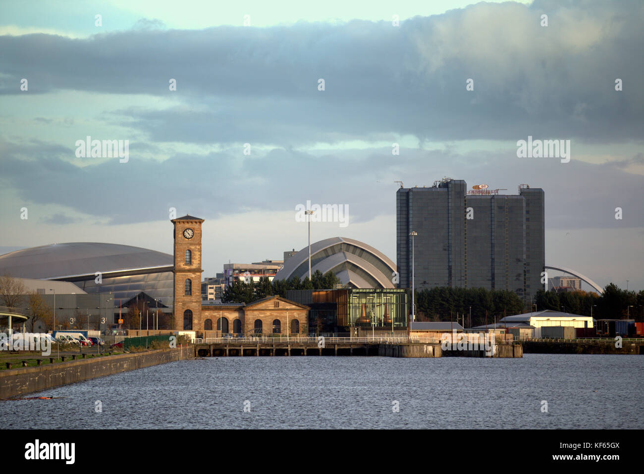 view across the clyde river to the whisky still Clydeside distillery on the left in Glasgow, Scotland from the clyde walkway at the transport museum Stock Photo