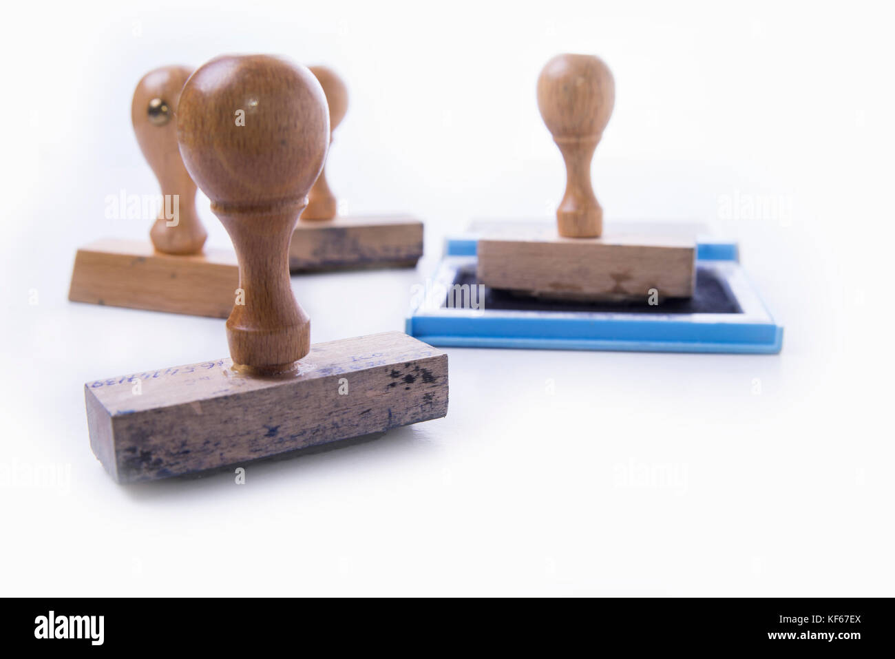 Old rubber stamp and pad on the white background Stock Photo - Alamy