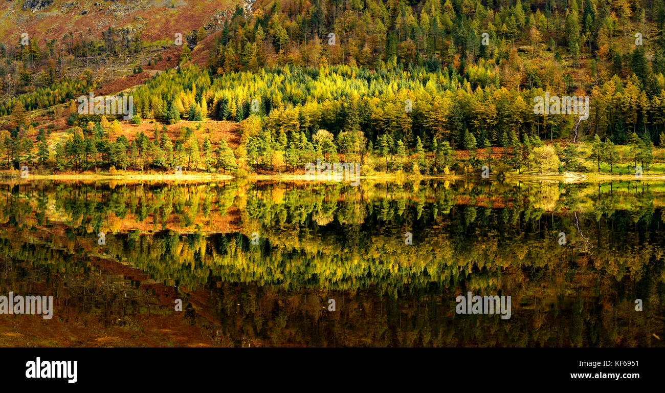 Beautiful mirror-like autumnal reflections on Thirlmere, Lake District National Park Stock Photo