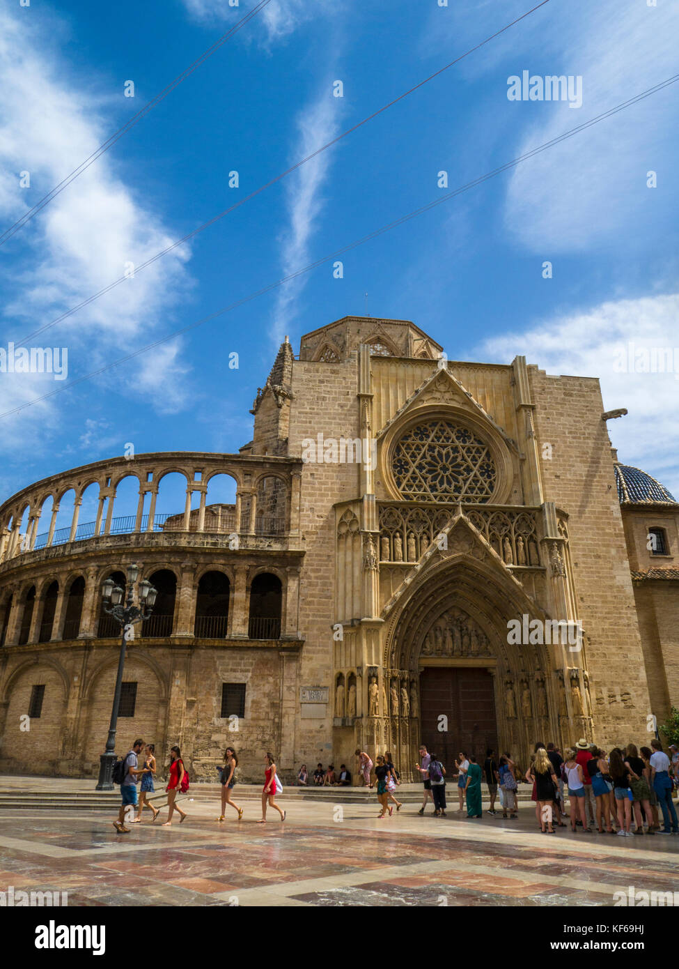 The facade and door of the Apostles (La Puerta de los Apostoles) of Valenica Cathedral viewed at la Plaza de la Virgen, Valencia, Spain. Stock Photo