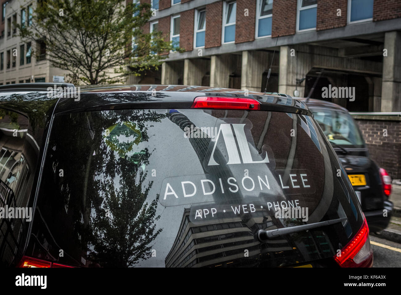 Rear window of an Addison Lee Minicab in London, UK Stock Photo