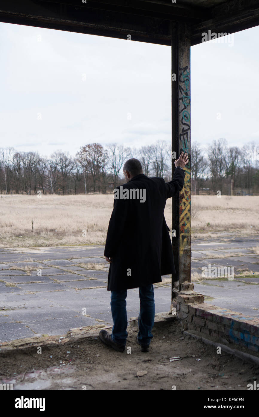Male rear view coat hi-res stock photography and images - Alamy