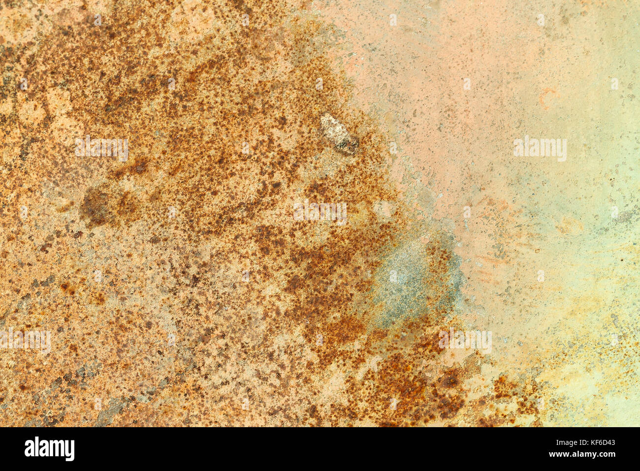 Rusted painted metal wall. Rusty metal background with streaks of rust