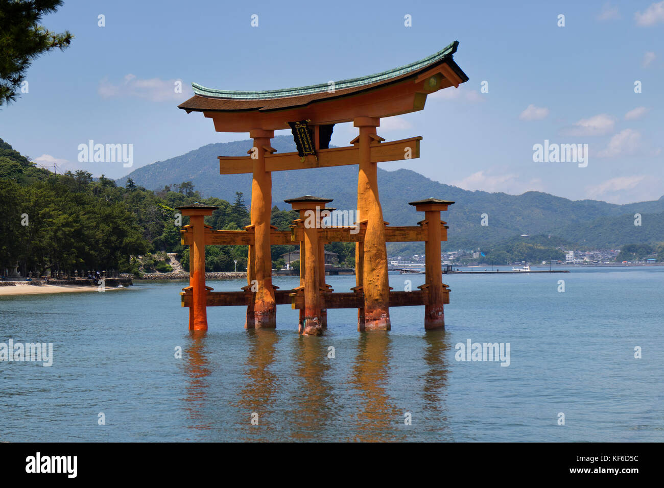 Miyajima - Japan, May 26, 2017: Red Torii gate of the Itsukushima Shrine in the sea near Miyajima Stock Photo