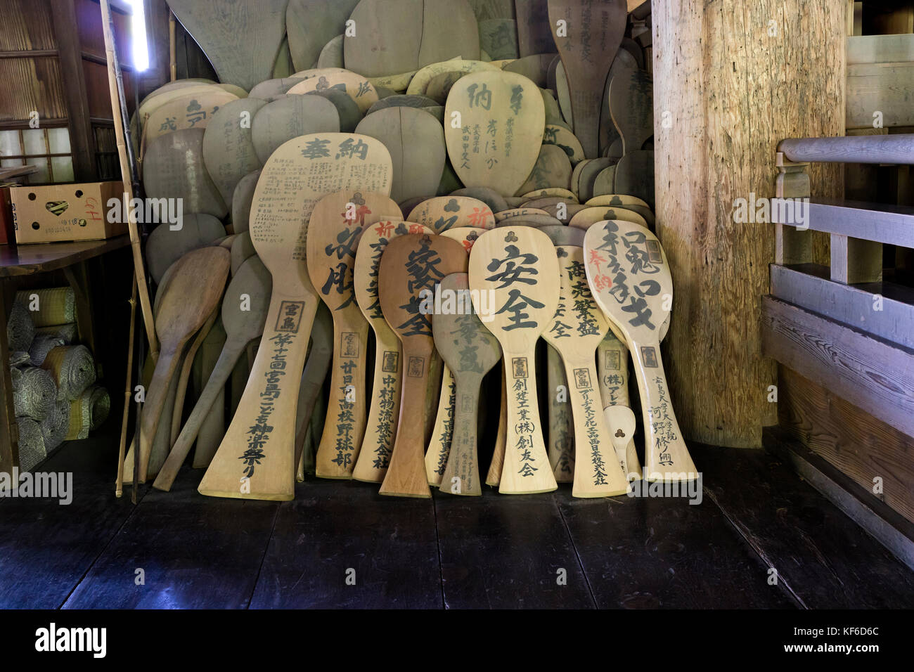 Miyajima, Japan - May 26, 2017: Giant wooden rice spoons, shamoji, in the Toyokuni Shrine, hall of One Thousand Tatami Mats Stock Photo