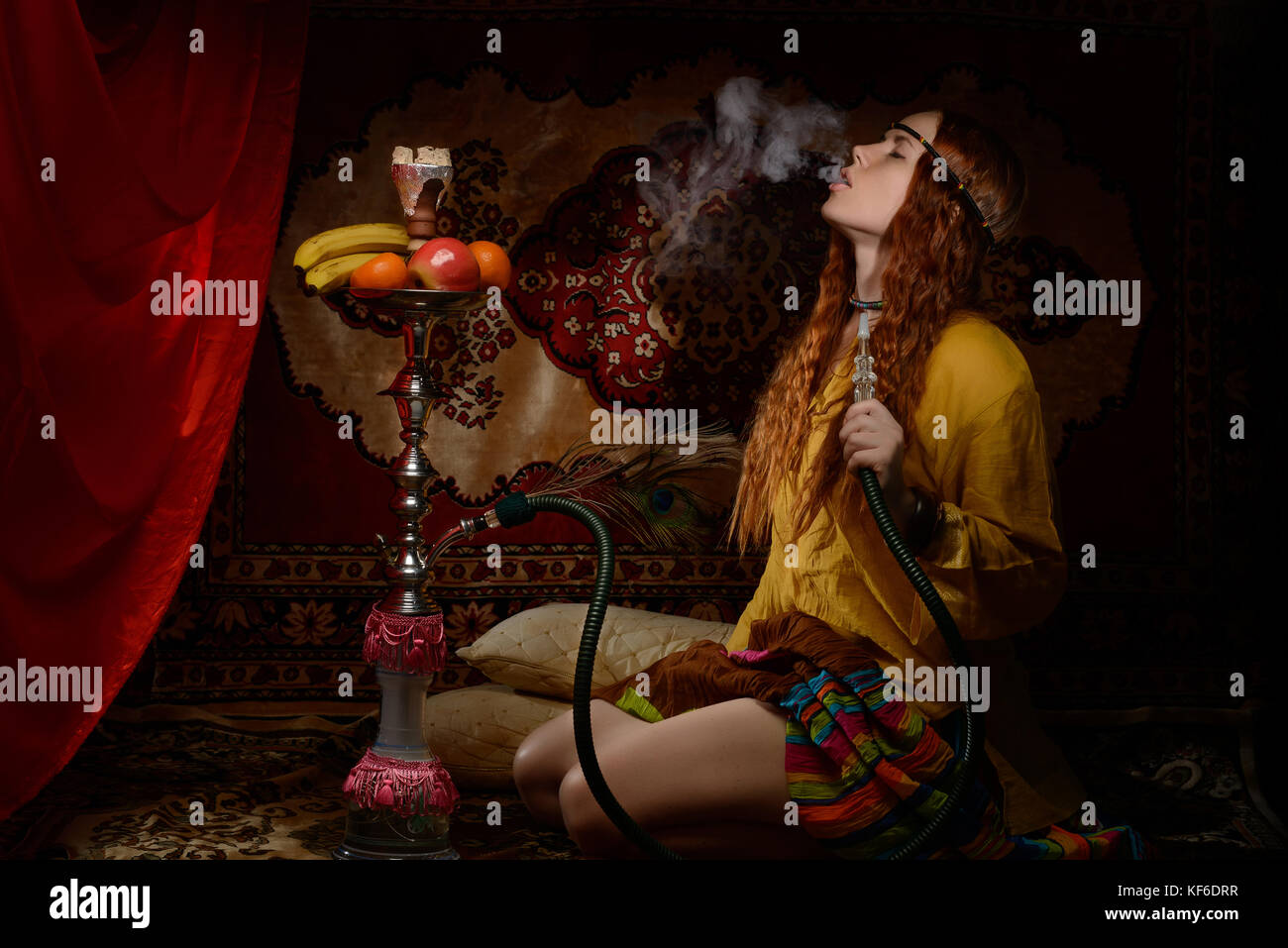 Hippie smoking hookah Stock Photo Alamy