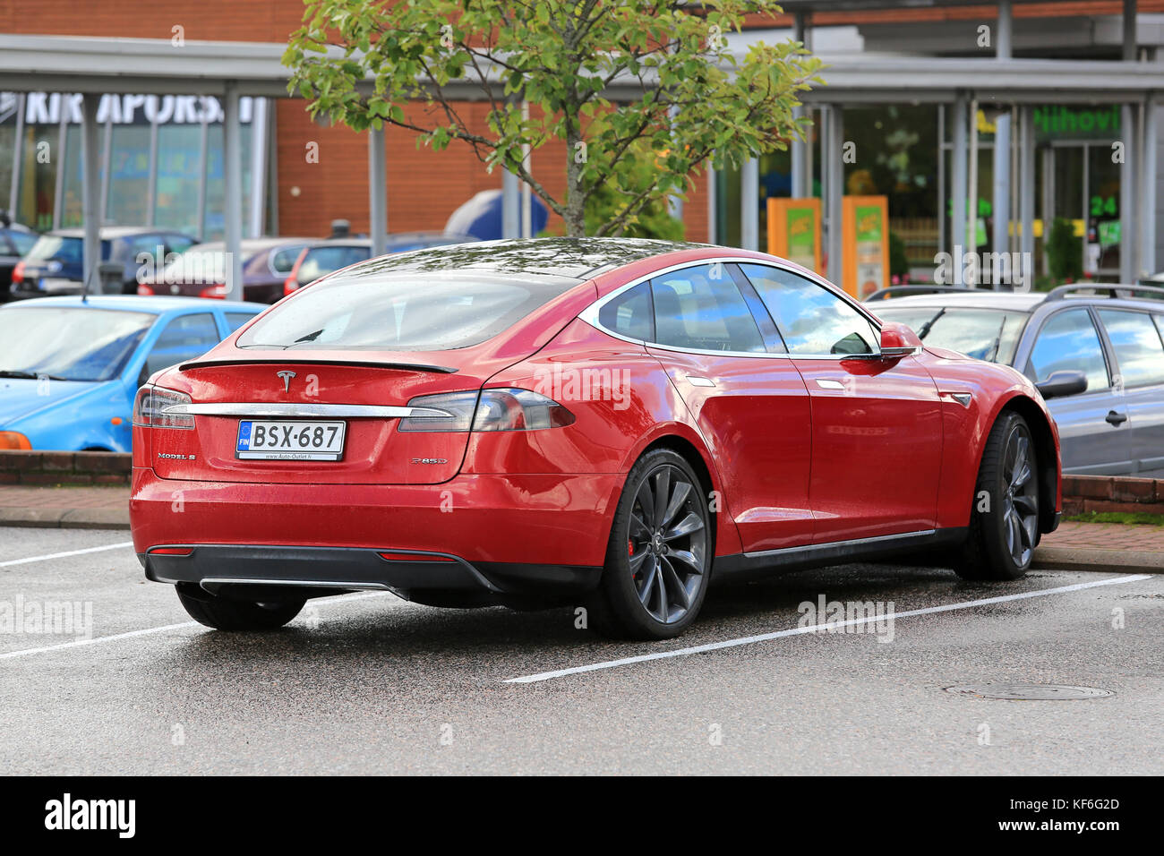 SALO, FINLAND - SEPTEMBER 5, 2015: Red Tesla Model S electric car parked at a station in Salo, Finland. According to Tesla, the P85D is c Photo - Alamy