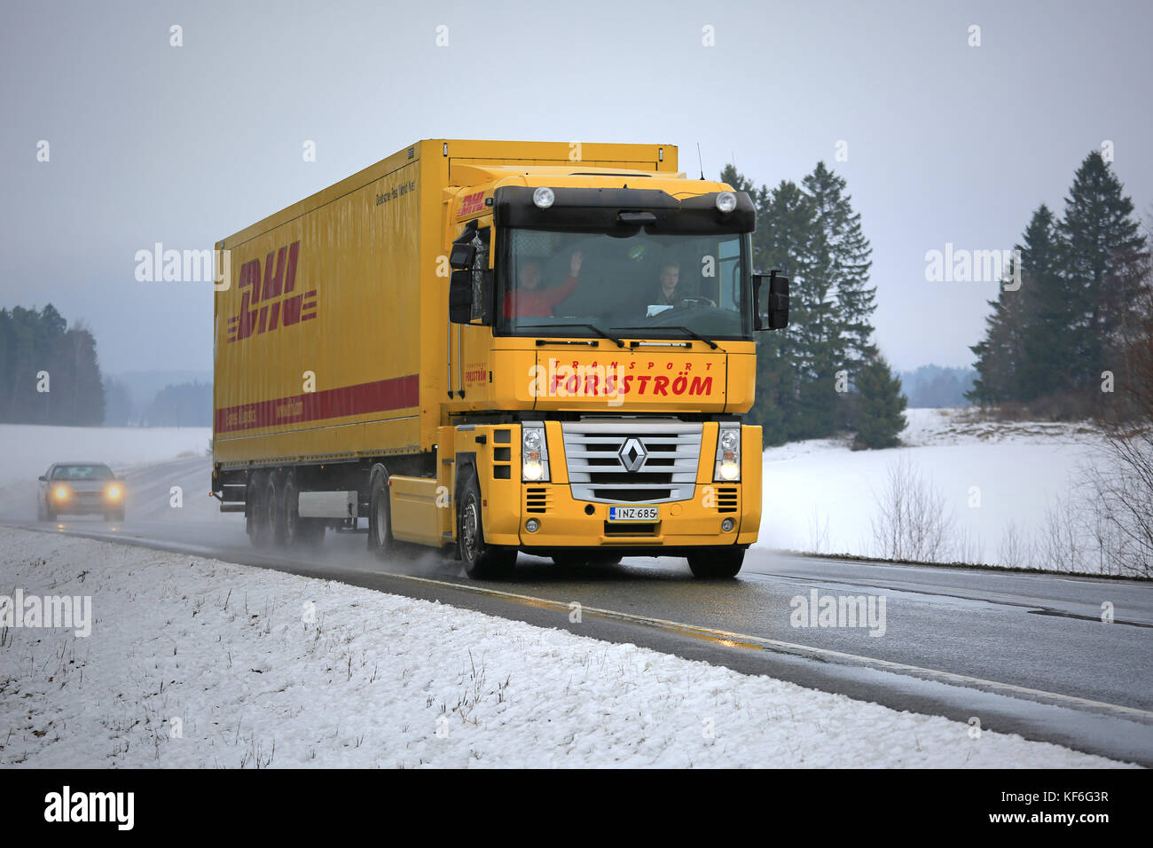 SALO, FINLAND - FEBRUARY 21, 2016: Yellow Renaut Magnum semi truck on the road in Finnish winter weather. Renault Magnum was manufactured in 1990-2013 Stock Photo