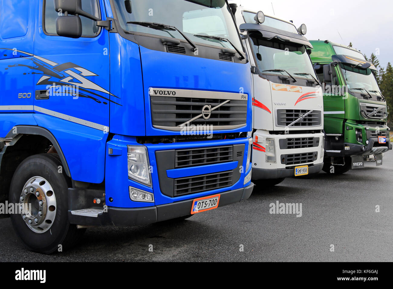LIETO, FINLAND - NOVEMBER 14, 2015: Lineup of three used Volvo trucks as seen on the Volvo Truck Center Turku Demo Drive and Tire Service Event. Stock Photo