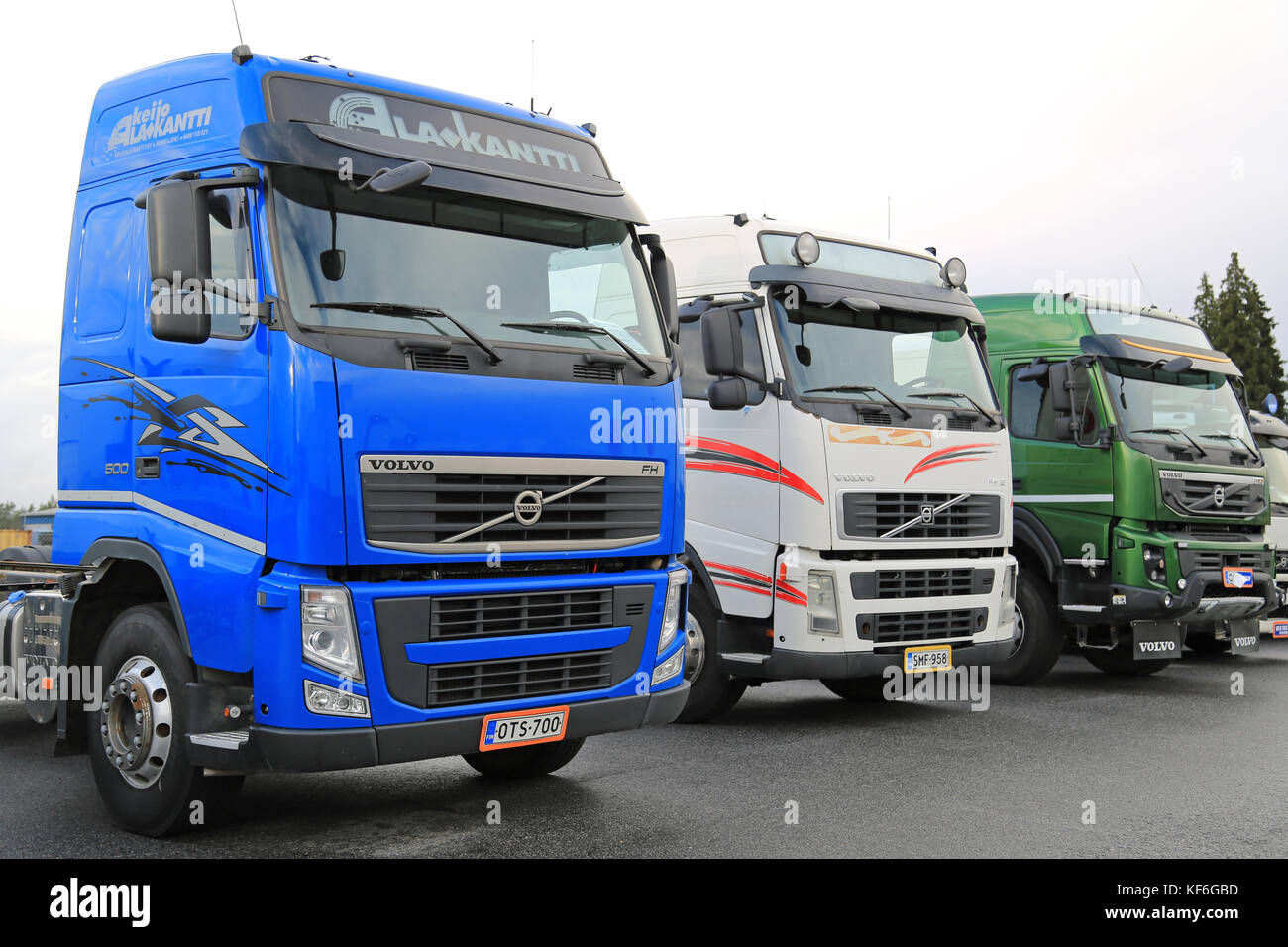 LIETO, FINLAND - NOVEMBER 14, 2015: Lineup of three used Volvo trucks as seen on the Volvo Truck Center Turku Demo Drive and Tire Service Event. Stock Photo
