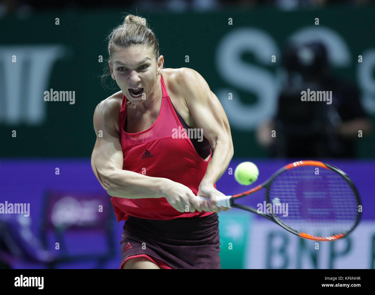 Singapore, Singapore. 25th Oct, 2017. Romanian tennis player Simona Halep  is in action during her first round robin match of the WTA Finals vs Danish  tennis player Caroline Wozniacki on Oct 25,
