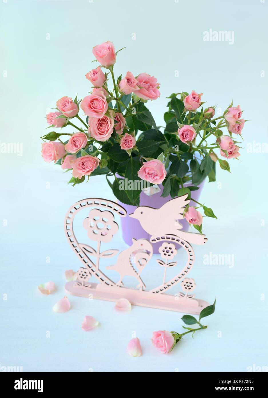 Still life with a bouquet of roses Stock Photo - Alamy