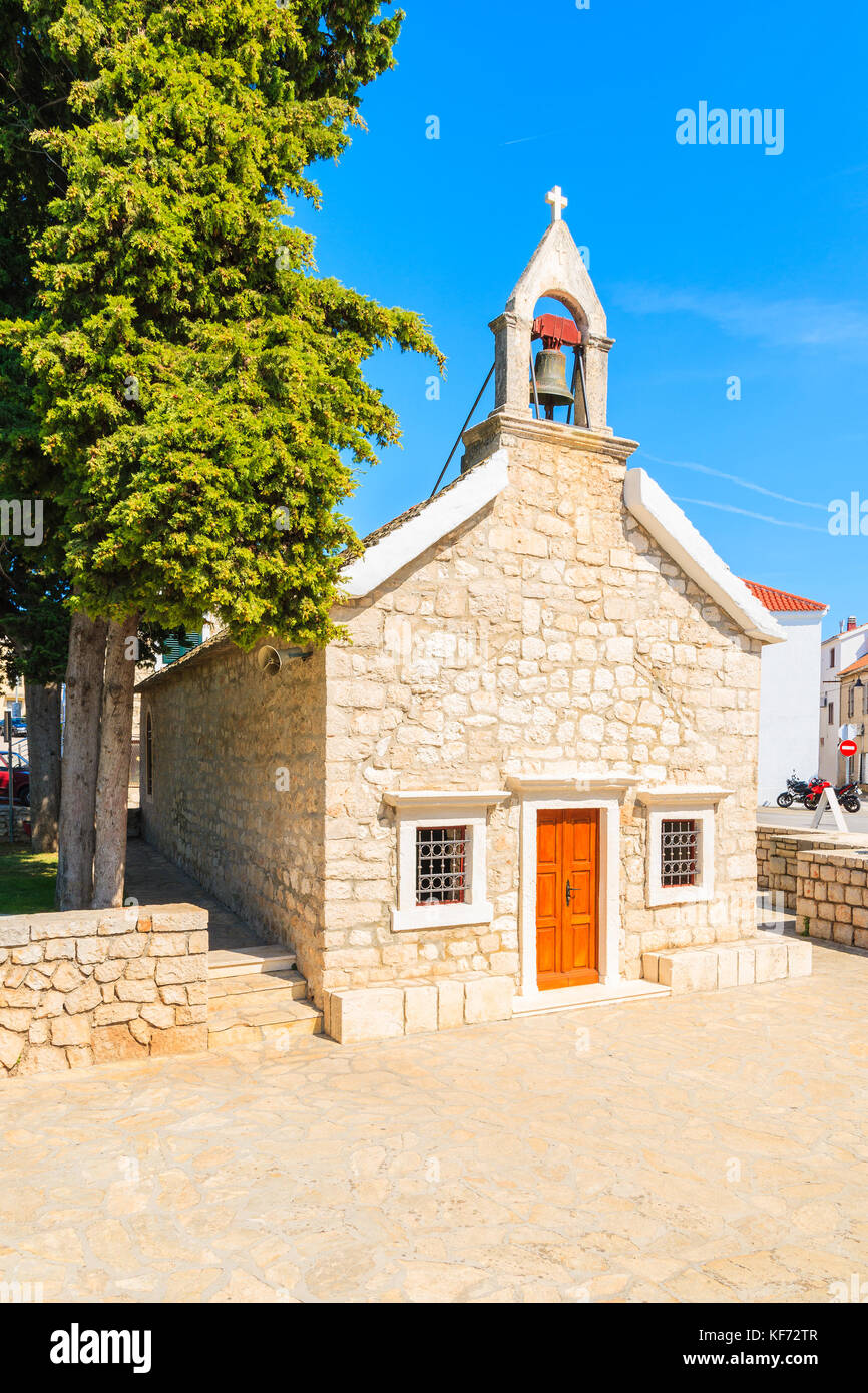 Small church in Primosten town park, Dalmatia, Croatia Stock Photo