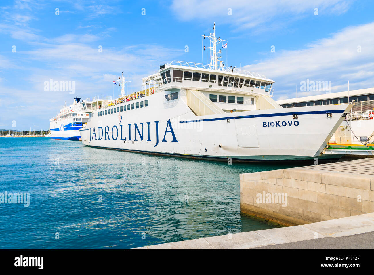 SPLIT PORT, CROATIA - SEP 7, 2017: large ferry ship carrying cars and passengers mooring in Split port before sailing to Brac island, Croatia. Stock Photo