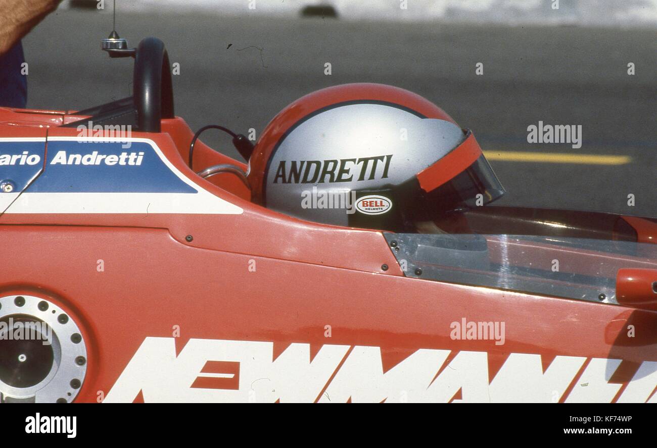 Mario andretti in cockpit of his indy car racer hires stock