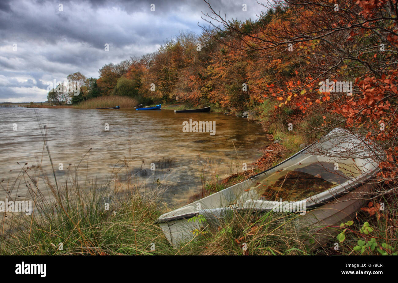 Colorful autumn landscape.Nature background.Boat on the lake in the ...
