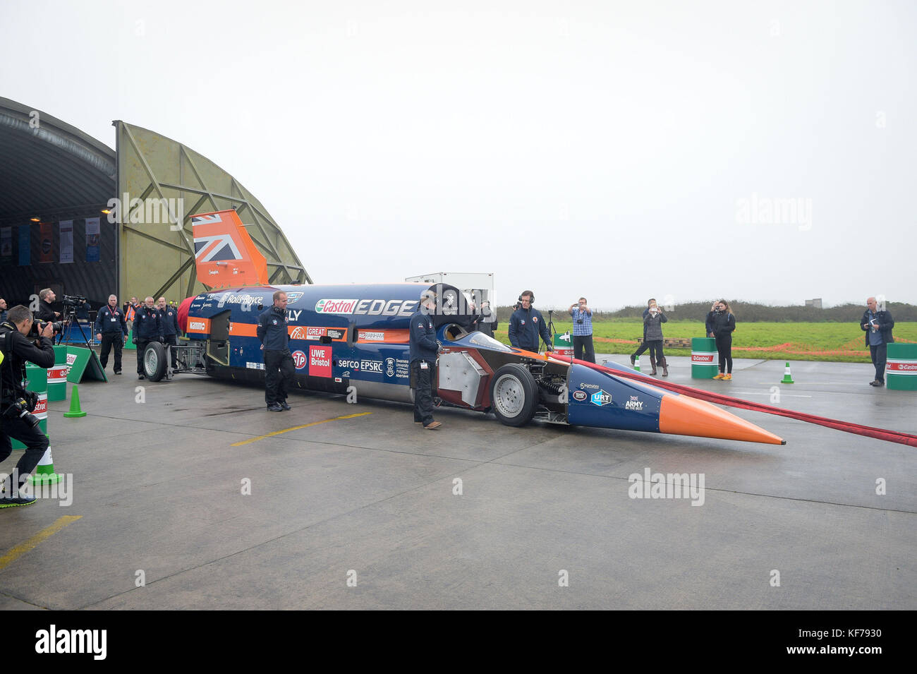 BLOODHOUND SSC is towed out of the hangar by technicians at Newquay airport, Cornwall, where the supersonic car prepares to make its first run up to 200mph. Stock Photo