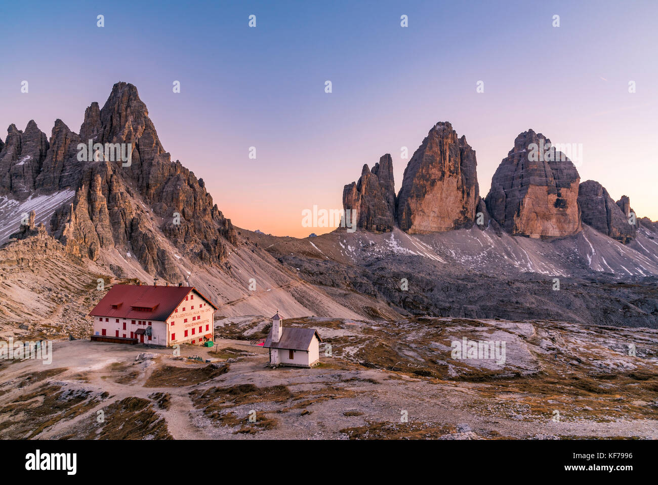 Tre Cime di Lavaredo peaks or Drei Zinnen at sunset, Dobbiaco - Toblach, Trentino - Alto Adige or South Tyrol, Italy Stock Photo