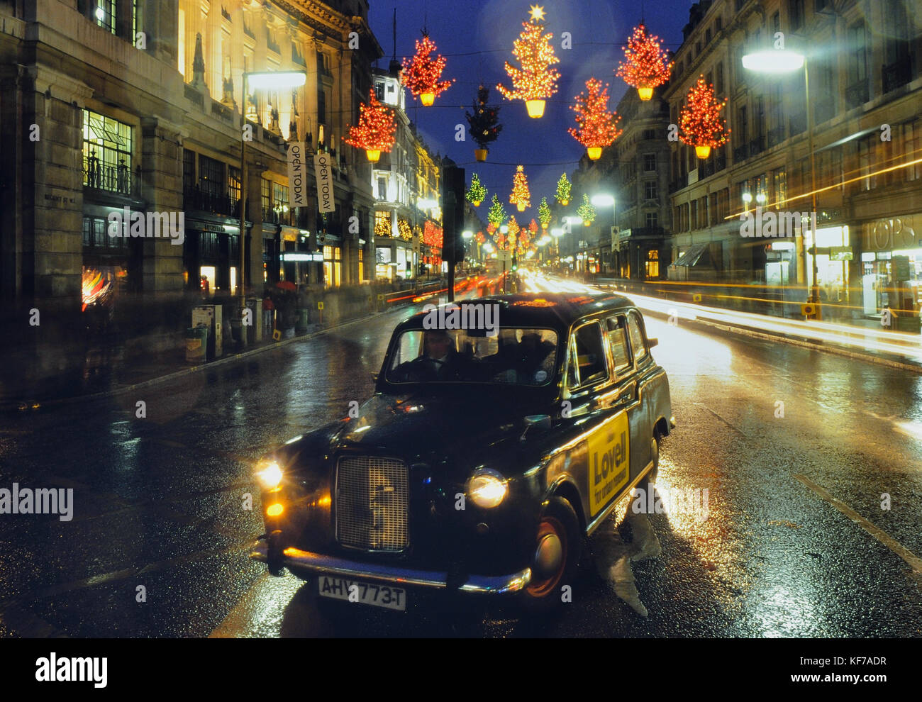 A black cab in Regent Street London during the Christmas lights festive