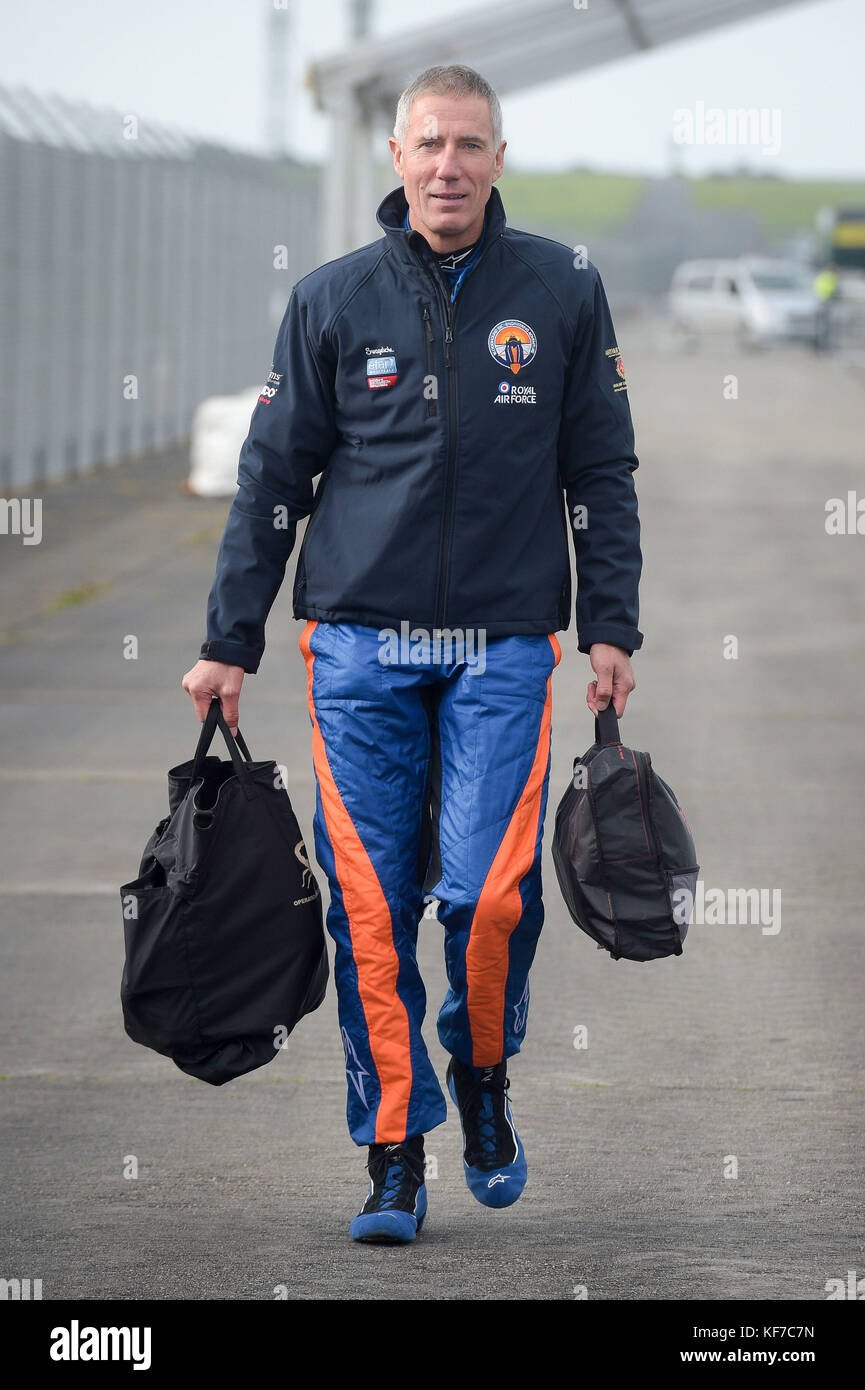 Pilot Andy Green makes his way to the Bloodhound 1,000mph supersonic racing car before its first public run at Cornwall Airport, near Newquay. Stock Photo