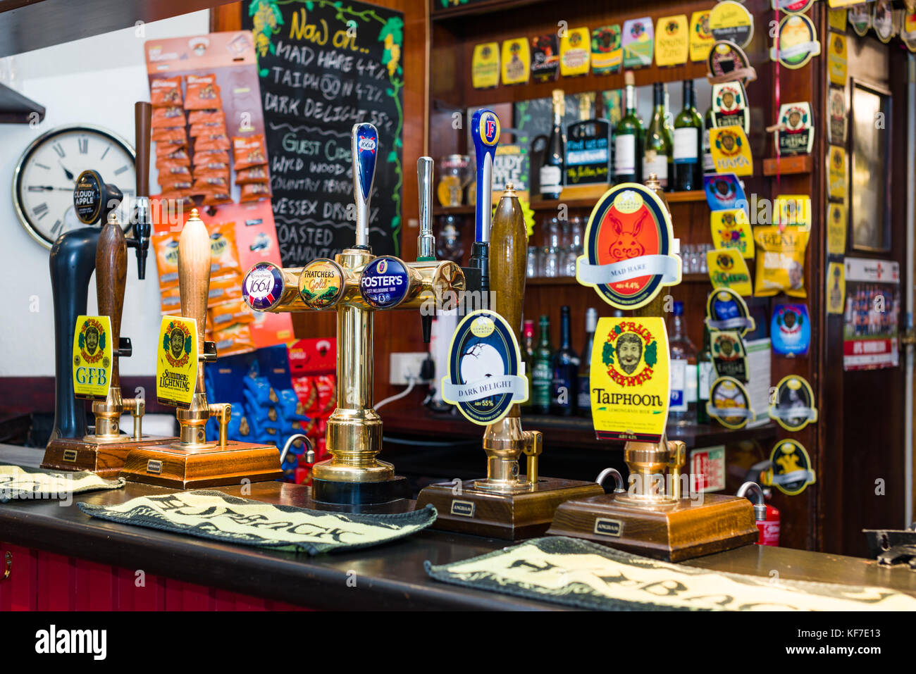 Typical pub interior showing cask ale hand pumps and back of serving area Stock Photo