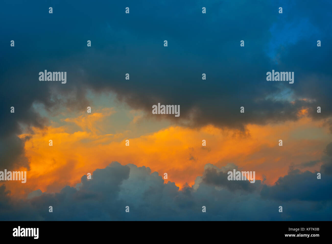 Dramatic clouds at sunset sky orange clouds Stock Photo - Alamy