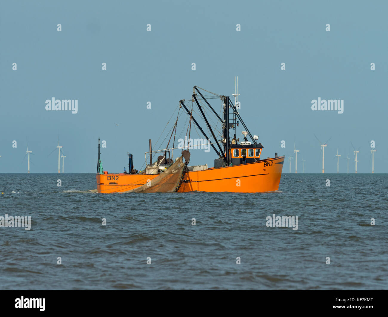 Boat fishing for prawns  off Titchwell Beach Nature Reserve Norfolk Stock Photo