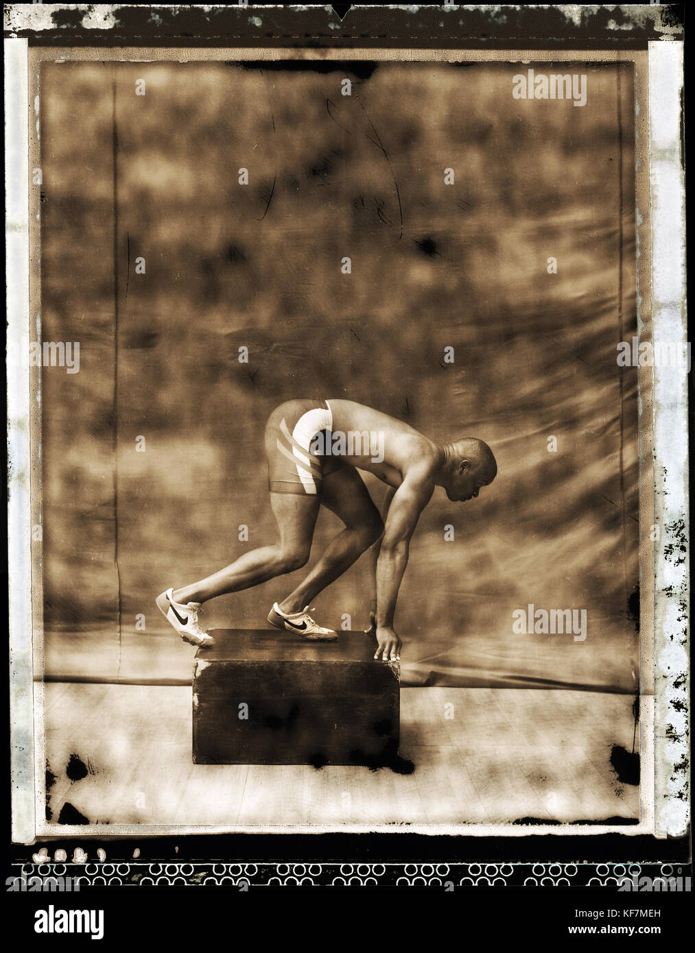 USA, California, USC track and field athlete in starting position, Los