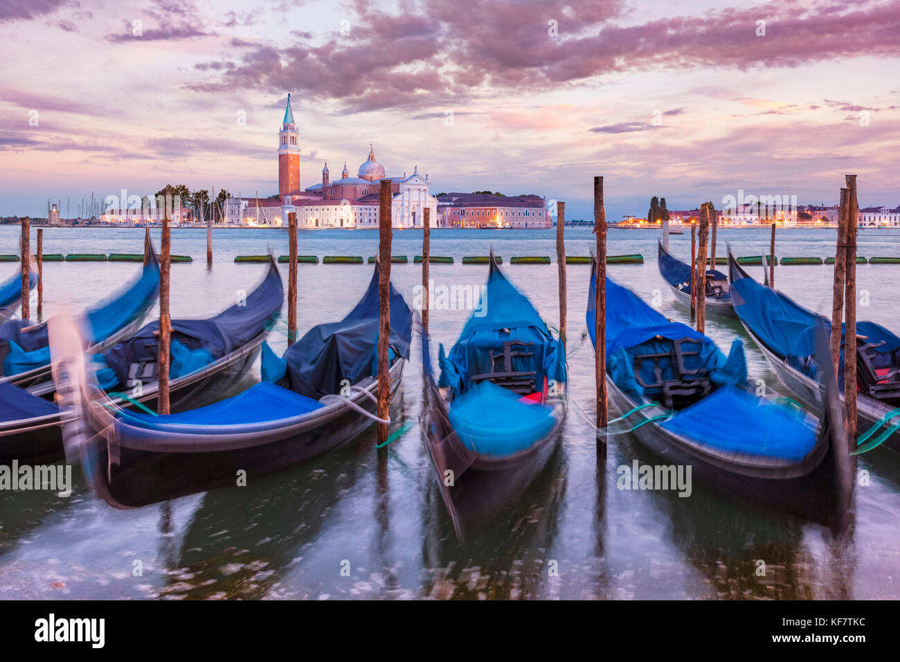 Gondolas Italy venice italy moored gondolas on the Grand Canal Venice opposite the Island of San Giorgio Maggiore Venice italy eu europe Stock Photo