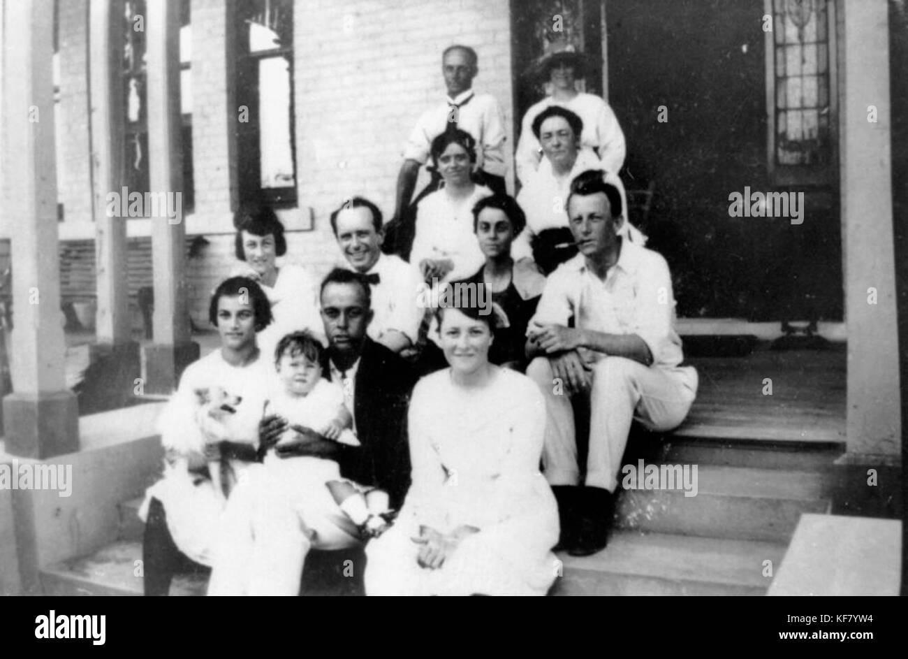 1 104188 Cribb Family sitting on the steps at Garowie, Ipswich in 1919