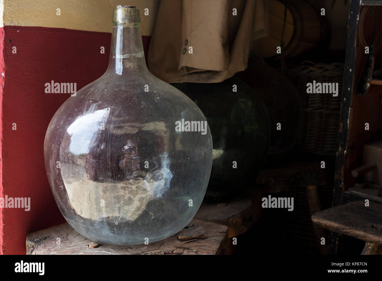 Old crystal wine carafe full of dust. Stock Photo