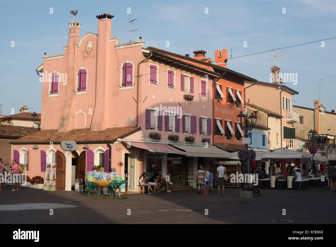 Ice cream parlour and tourist shops on Rio Terra, Caorle, Veneto Stock Photo