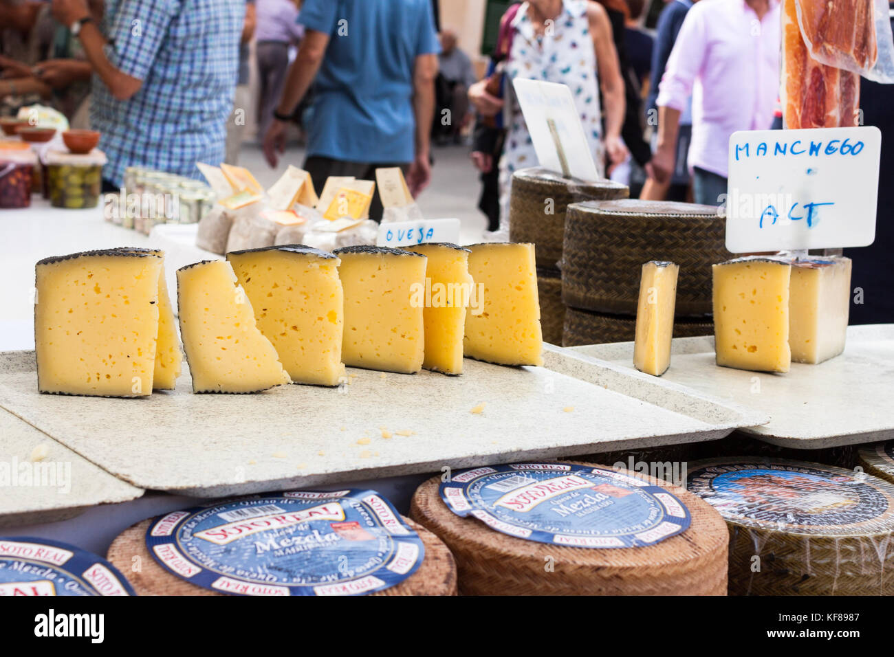 Manchego cheese for sale in the stall of Sineu market, Mallorca, Spain