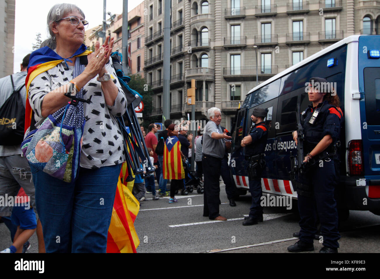 Barcelona, Spain. 21st Oct, 2017. Thousands of people, led by the President of Catalonia Carles Puigdemont, take to the streets of Barcelona, Spain on Stock Photo