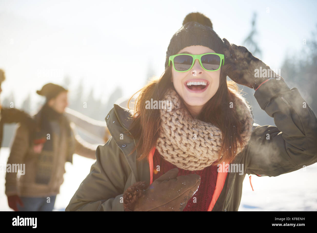 Cheerful woman in warm clothes Stock Photo