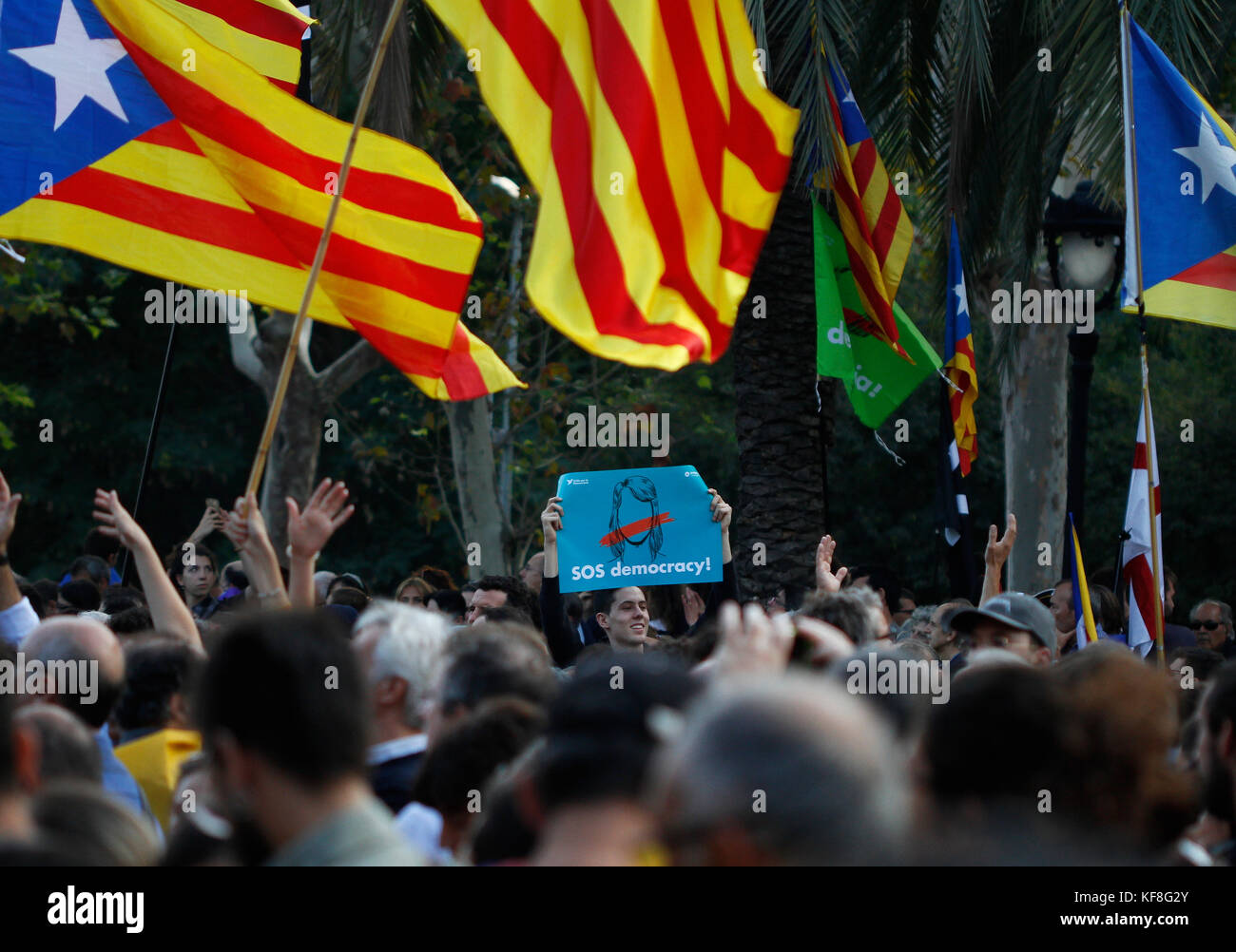 People wait in the streets of Barcelona, Spain on October 10, 2017 for President of Catalonia Carles Puigdemont to Stock Photo