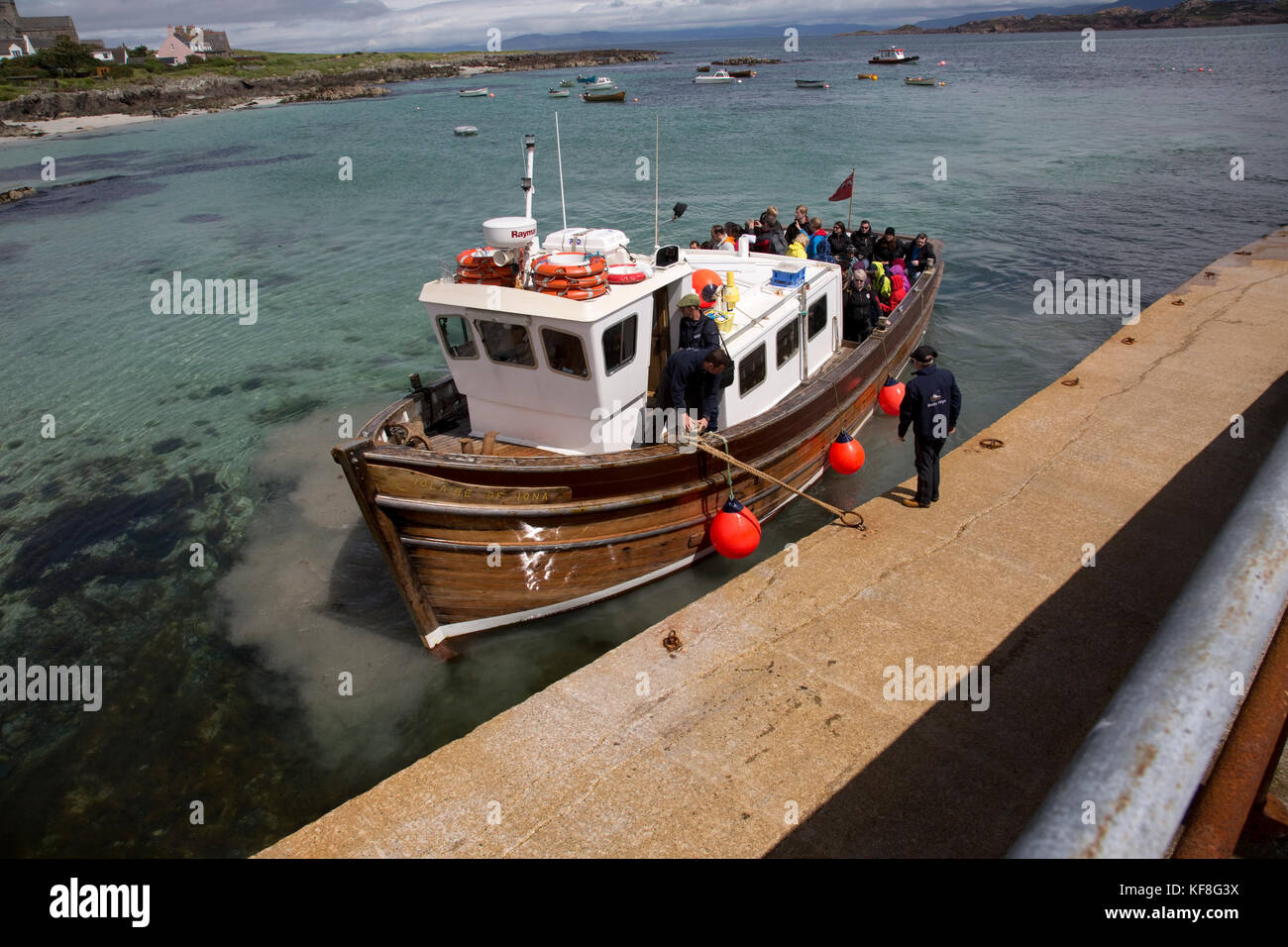 Tourists on Iolaire of Iona boat trip to Staffa Iona harbour Scotland Stock Photo