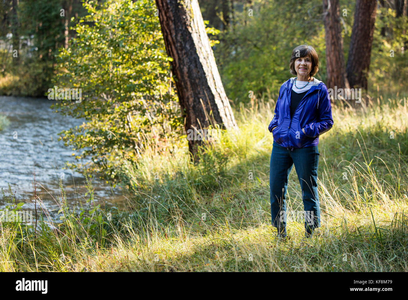 USA, Oregon, Camp Sherman, Metolius River trail, woman Stock Photo