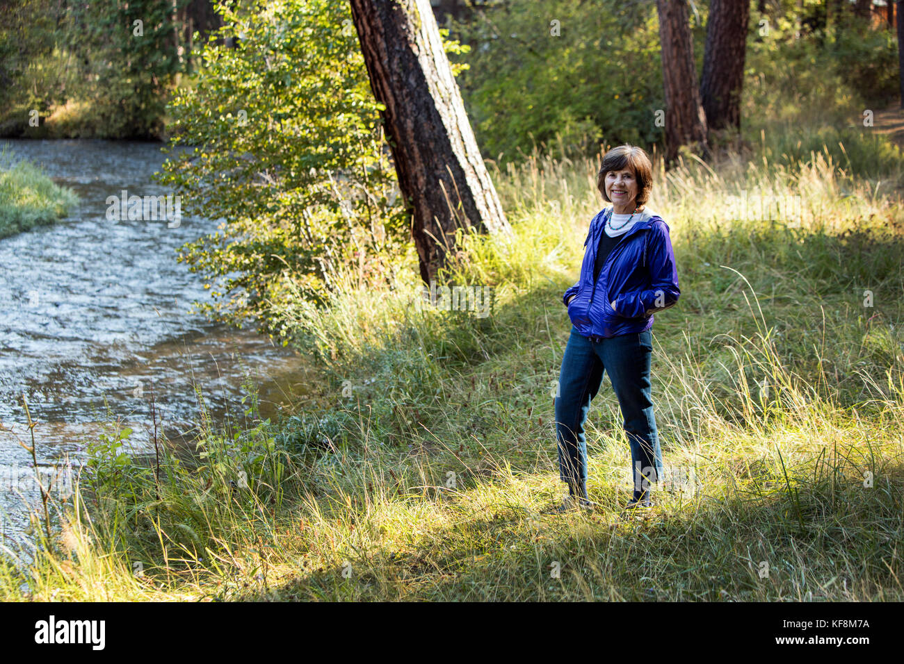 USA, Oregon, Camp Sherman, Metolius River trail, woman Stock Photo