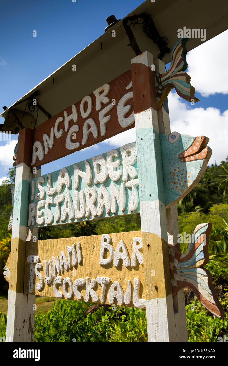 The Seychelles, Mahe, Anse a La Mouche, beach, Anchor Café, Islander Restaurant, and Tsunami Bar, fish themed sign Stock Photo