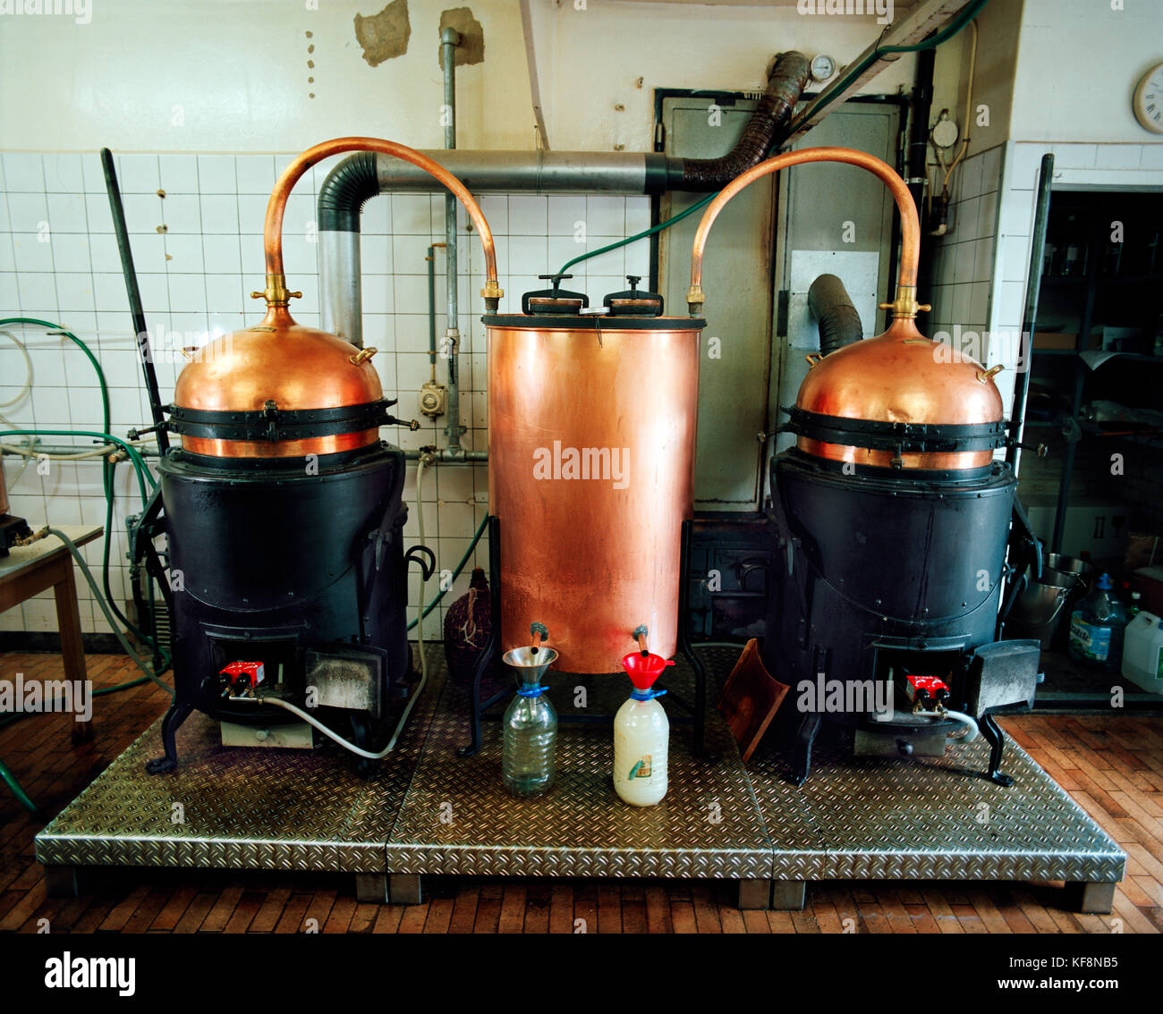 SWITZERLAND, Couvet, copper vats used to produce Absinthe at the Artemisia Distillerie, Jura Region Stock Photo